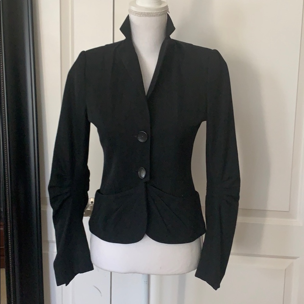 Development by Erica Davies black jacket